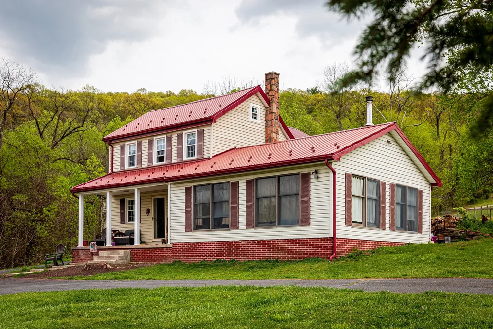 Farmhouse windows & red metal roof, photo 1