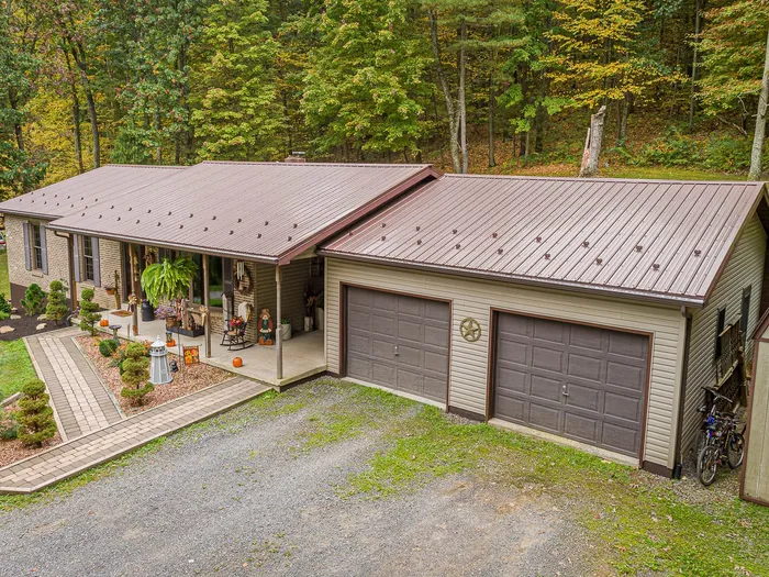 Bronze exposed-fastener metal roof