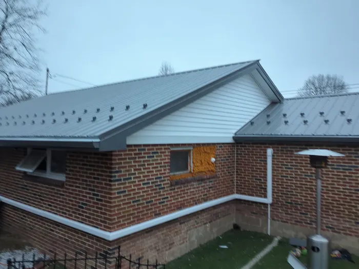 Metal Roofing Replacement and Sunroom Addition in Halifax