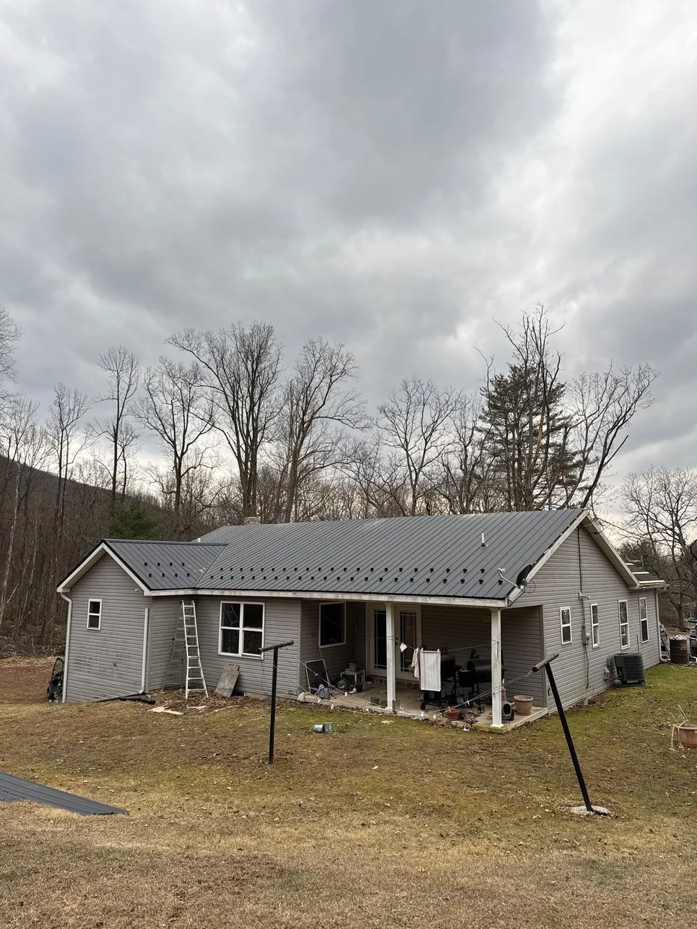 Black Metal Roof Replacement and Gutter Installation in Halifax, Halifax, PA, photo 7