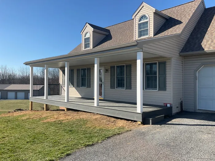 Custom Porch Roof Addition and Siding Renovation in Myerstown, PA