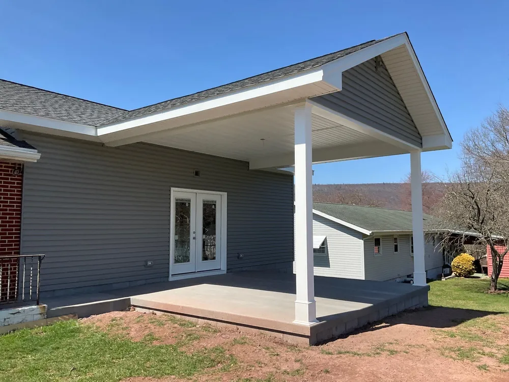 Tower City Residential Addition Featuring Gray Vinyl Siding and Garage, Tower City, PA, photo 2