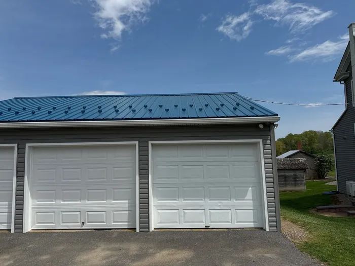 3-Car Garage refresh Blue Metal Roofing in Herndon