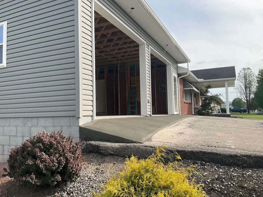 Tower City Residential Addition Featuring Gray Vinyl Siding and Garage, Tower City, PA, photo 10