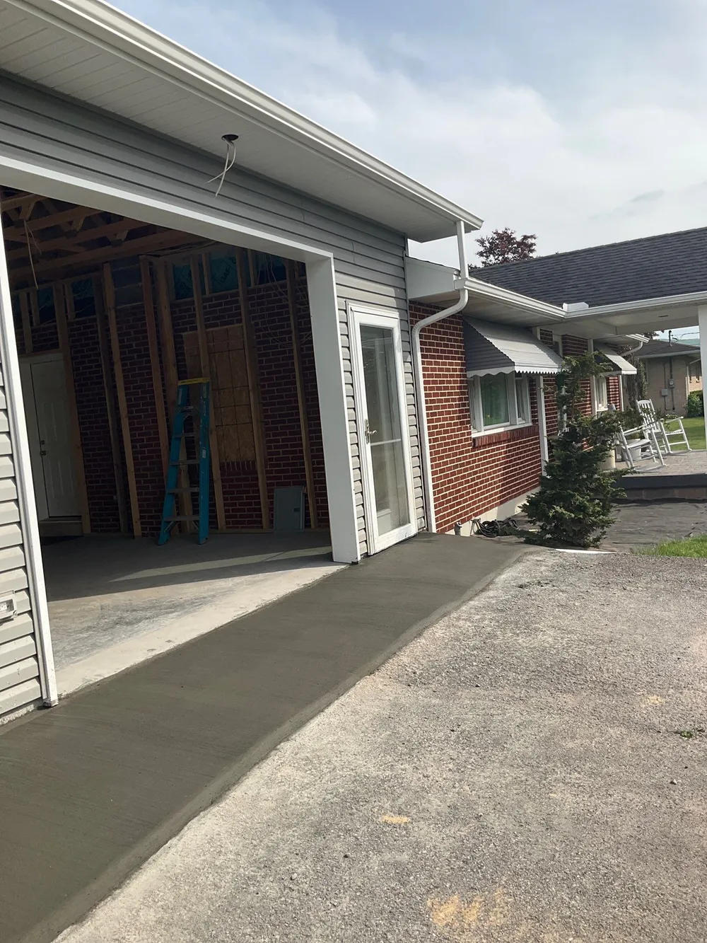 Tower City Residential Addition Featuring Gray Vinyl Siding and Garage, Tower City, PA, photo 6