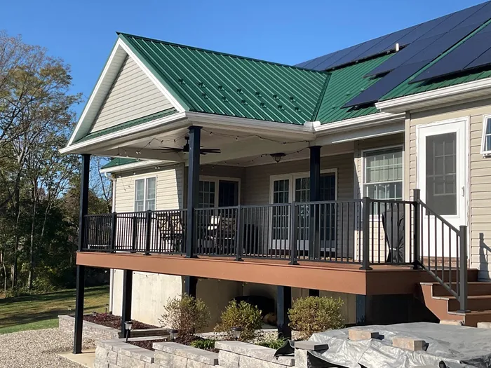 Green  Metal Roof and Custom Covered Deck in Duncannon