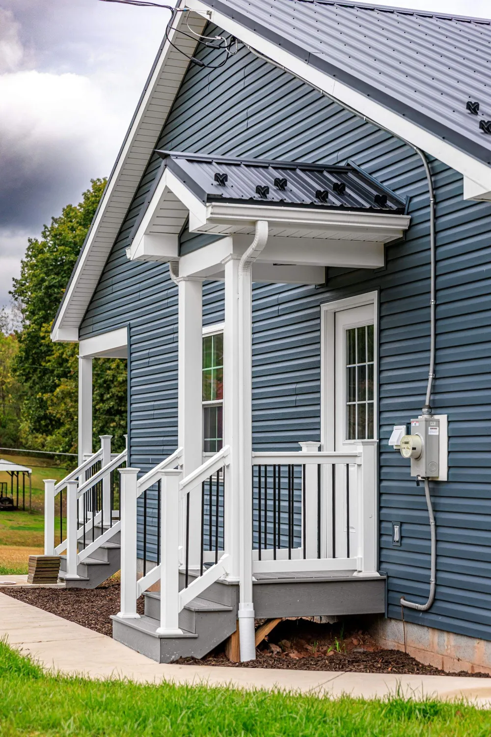 New Residential Addition with Blue Siding and Metal Roofing in Ashland, Ashland, PA, photo 1