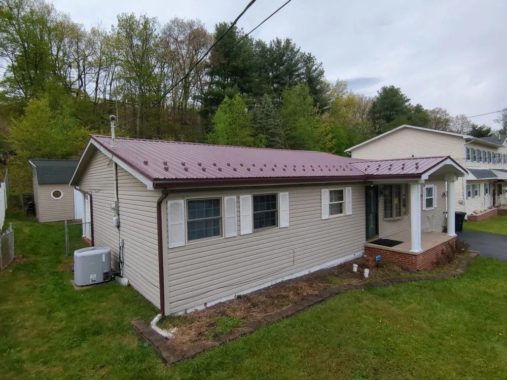 Maroon ABM Metal Roof Replacement and Gutter Installation in Shenandoah, Shenandoah, PA, photo 11