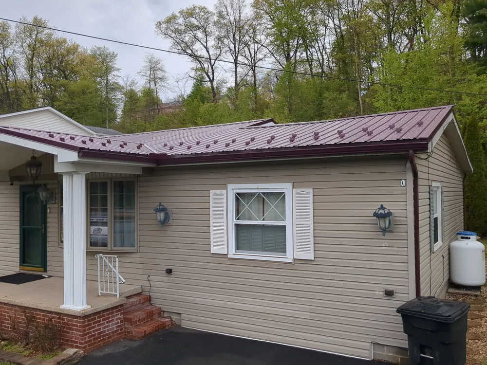 Maroon ABM Metal Roof Replacement and Gutter Installation in Shenandoah, Shenandoah, PA, photo 10