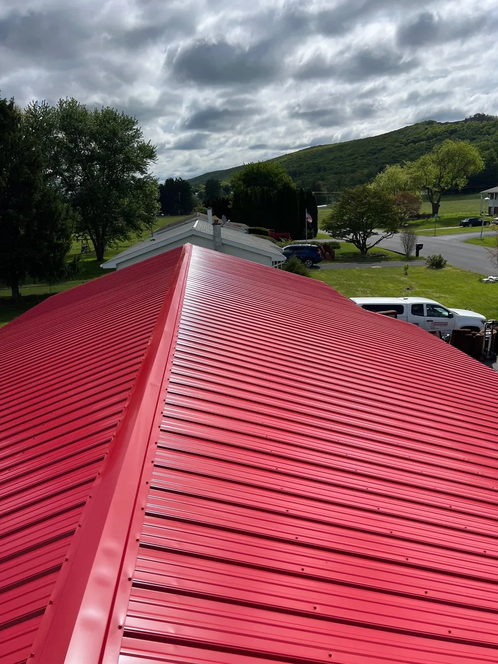 Red ABM Panel Metal Roofing Installation on Elizabethville Ranch Home, Elizabethville, PA, photo 6