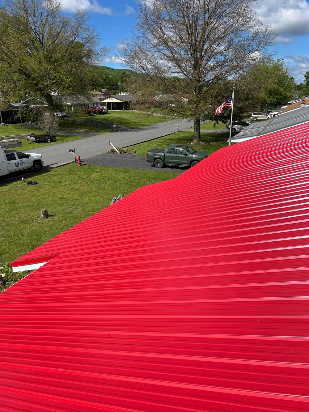 Red ABM Panel Metal Roofing Installation on Elizabethville Ranch Home, Elizabethville, PA, photo 4
