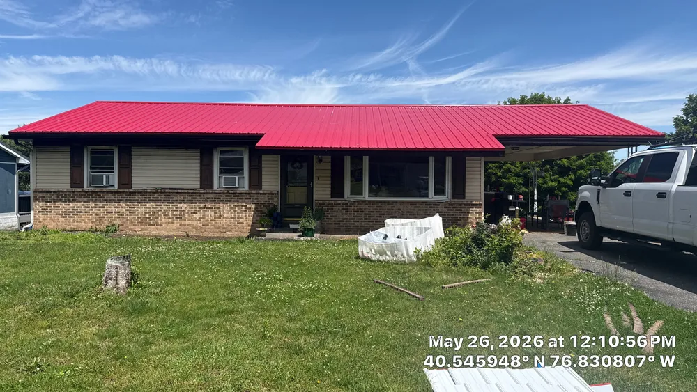 Red ABM Panel Metal Roofing Installation on Elizabethville Ranch Home, Elizabethville, PA, photo 1