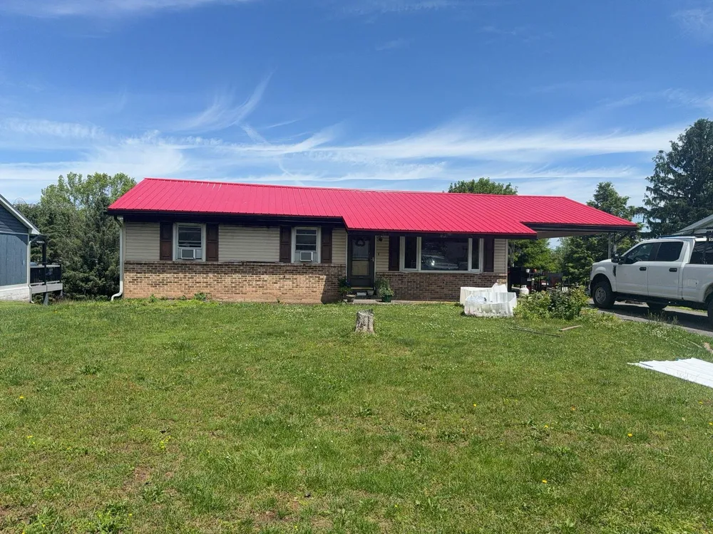 Red ABM Panel Metal Roofing Installation on Elizabethville Ranch Home, Elizabethville, PA, photo 11