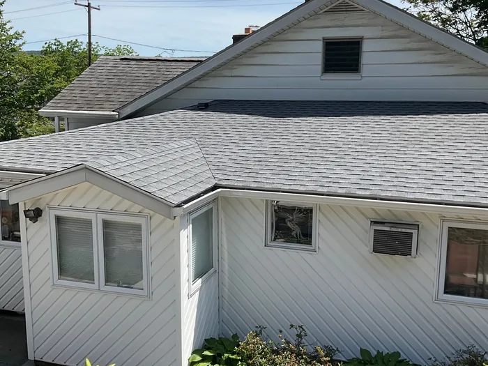 Shingle Roof Replacement and Seamless Gutter Installation in Lavelle